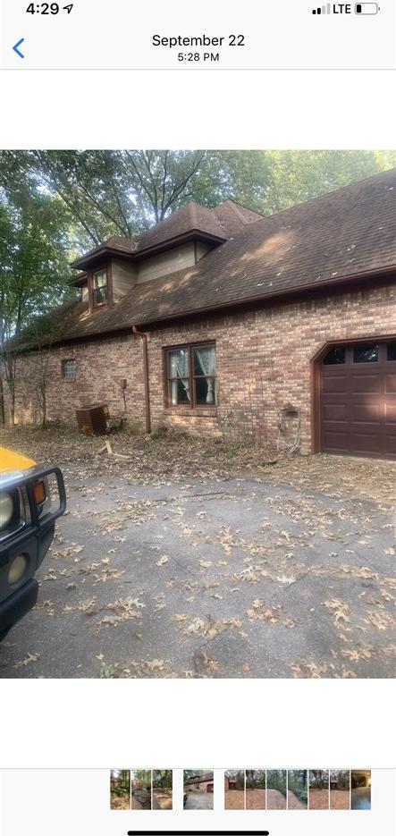 view of home's exterior with a garage