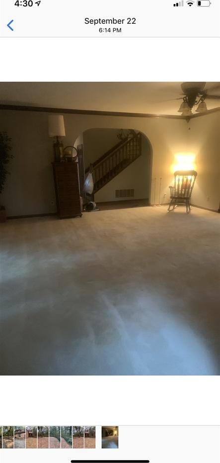 unfurnished bedroom featuring concrete flooring and ceiling fan