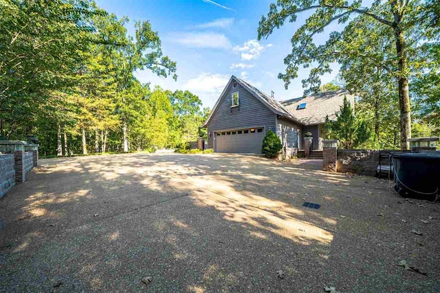 exterior space with a garage