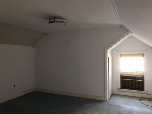 bonus room with vaulted ceiling