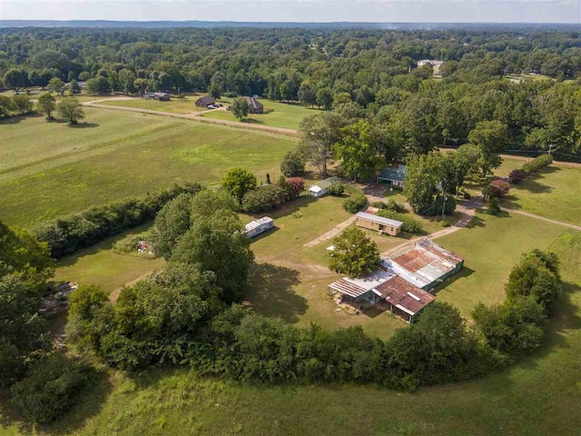 birds eye view of property with a rural view