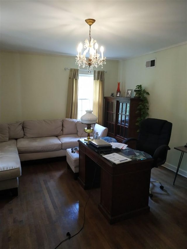 interior space featuring crown molding, dark hardwood / wood-style floors, and a chandelier