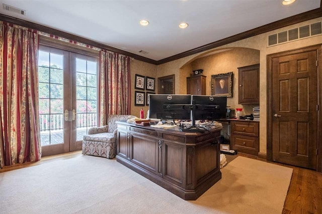 office area featuring french doors, ornamental molding, and light hardwood / wood-style floors