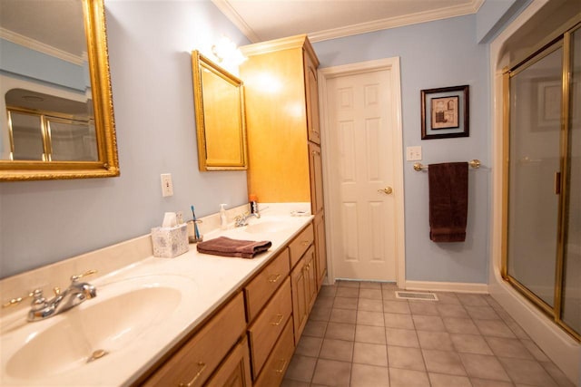 bathroom with crown molding, tile floors, and double vanity