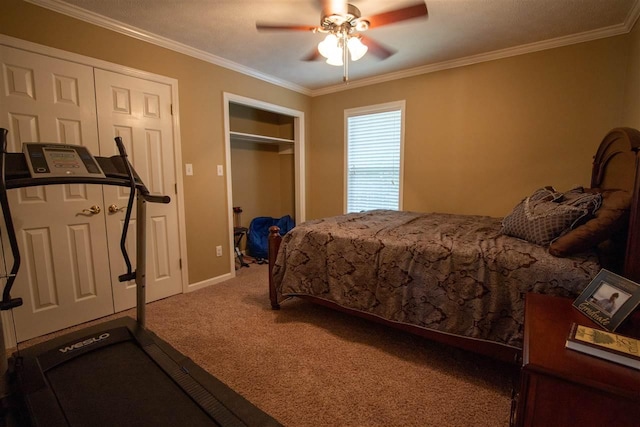 carpeted bedroom featuring ceiling fan and crown molding