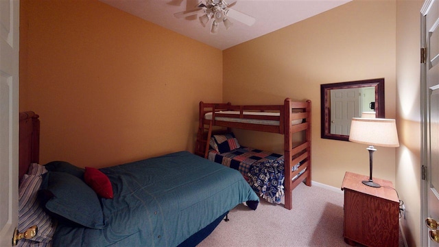 bedroom featuring ceiling fan and carpet floors