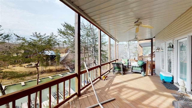 wooden terrace with ceiling fan