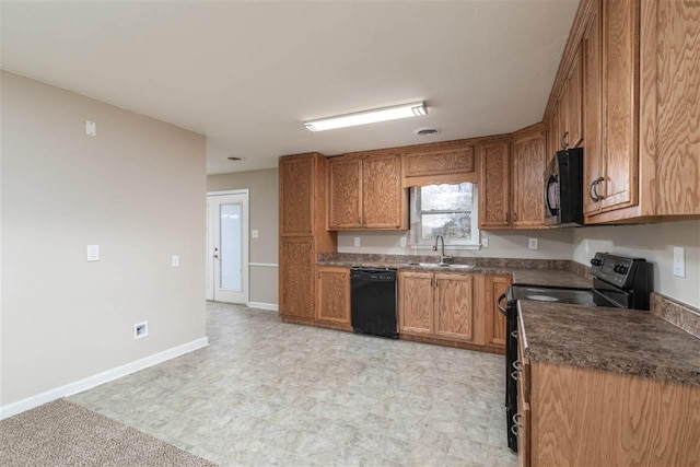 10736 Holly Grove Road, Gilt Edge, TN 38011 - kitchen with sink, light tile floors, and black appliances