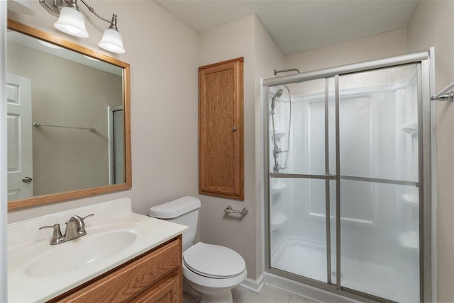 10736 Holly Grove Road, Gilt Edge, TN 38011 - bathroom featuring an enclosed shower, vanity, tile flooring, and toilet