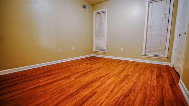 unfurnished room featuring light hardwood / wood-style floors