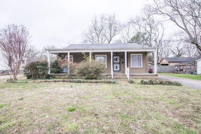 view of front of home featuring a porch and a front yard