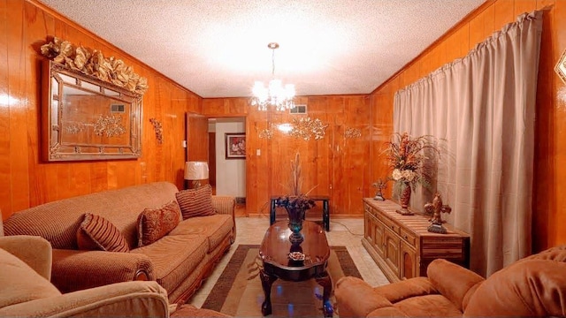 living room featuring wood walls, a chandelier, and light tile flooring