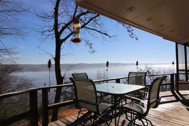 deck featuring a water view