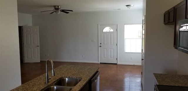 2103 Campground Road, Munford, TN 38058 - kitchen with ceiling fan, stone counters, dishwasher, sink, and dark tile floors