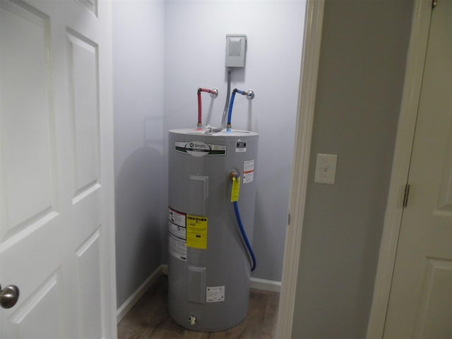 utility room with water heater