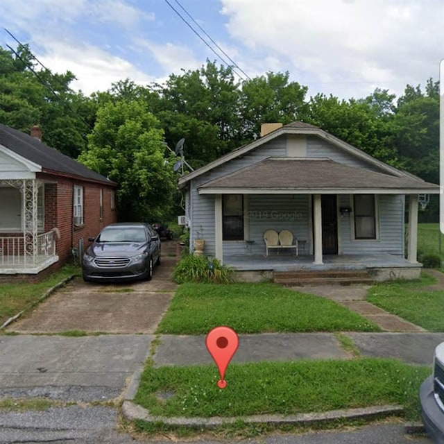 bungalow-style home with a porch