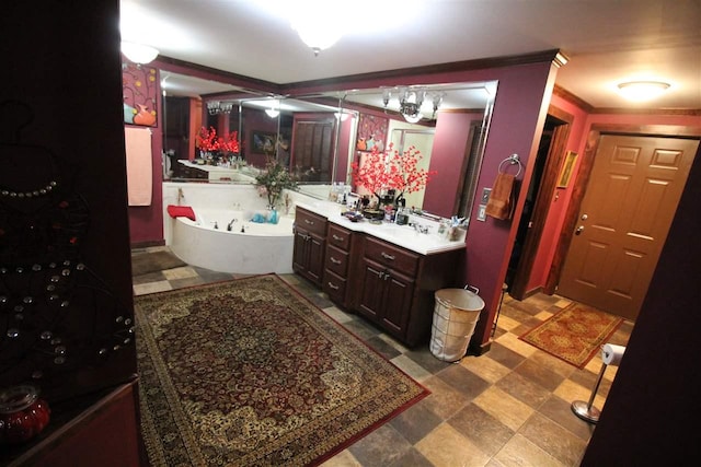 180 Holly Grove Road, Covington, TN 38019 - bathroom featuring ornamental molding, large vanity, tile floors, and a washtub