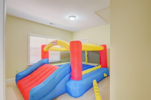 bedroom with light carpet