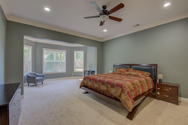 bedroom with light carpet, ornamental molding, and ceiling fan