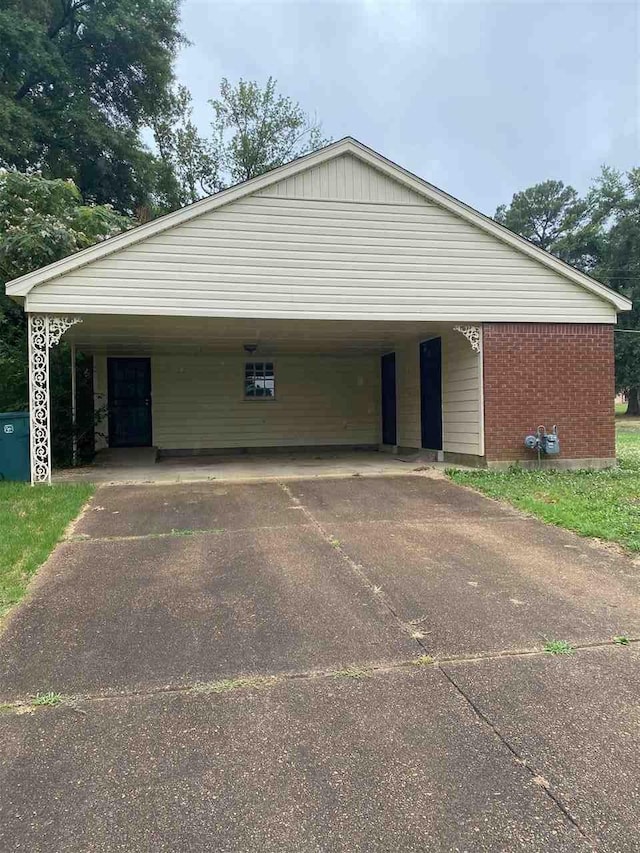 exterior space featuring a carport