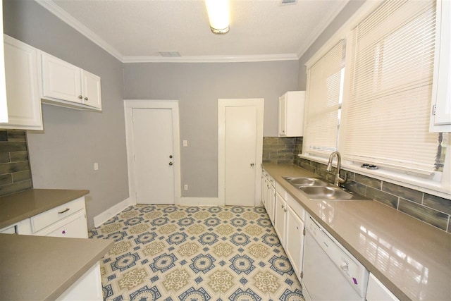 kitchen featuring light tile flooring, backsplash, white cabinetry, and sink