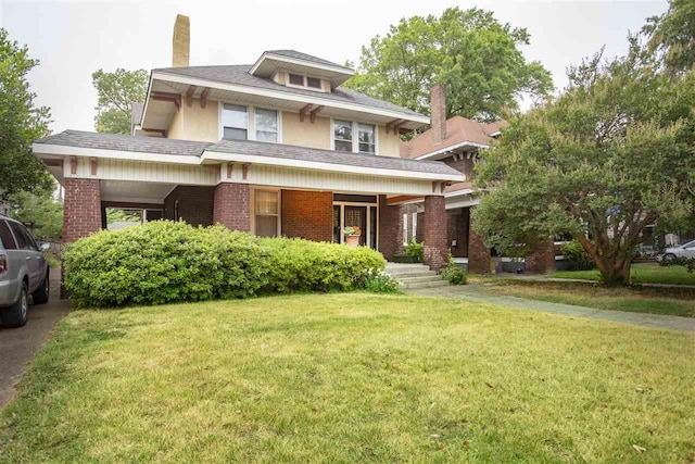 view of front of property featuring a porch and a front lawn