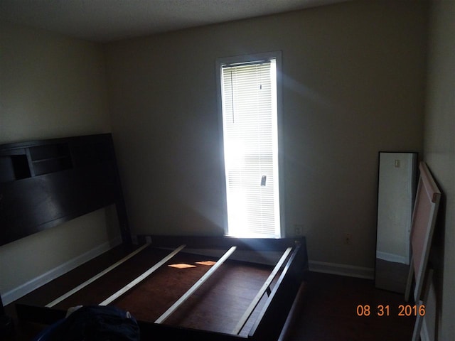 bedroom with multiple windows