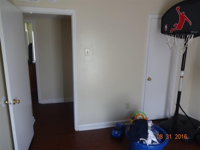 misc room featuring dark wood-type flooring