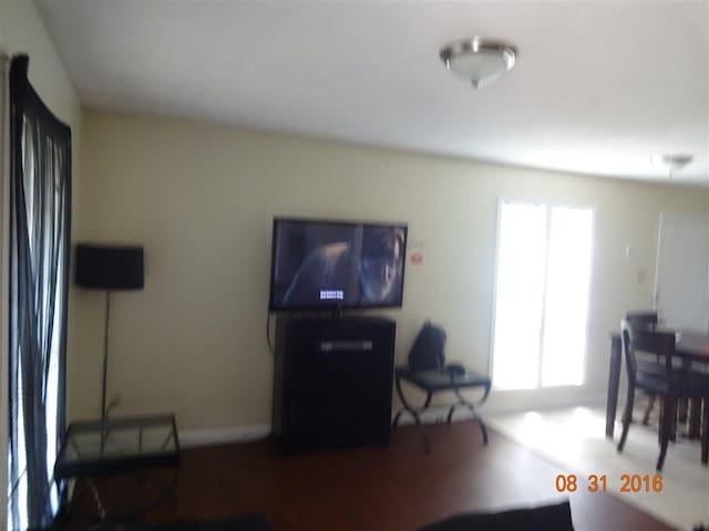 living room featuring a healthy amount of sunlight