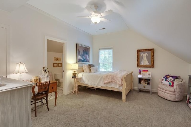 bedroom with light colored carpet, vaulted ceiling, and ceiling fan