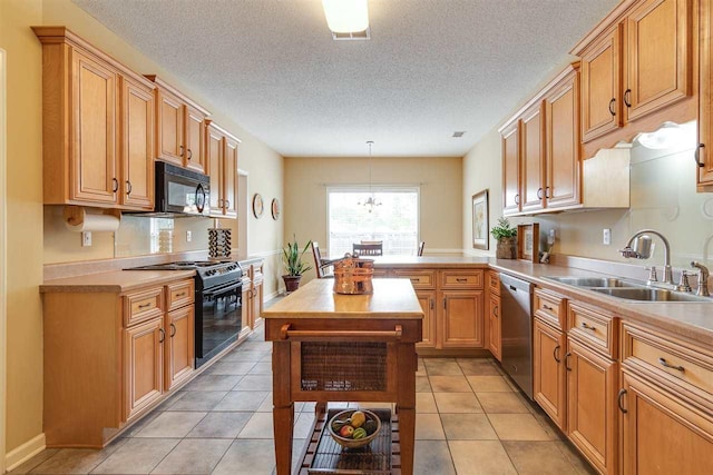 kitchen with stainless steel dishwasher, light tile floors, sink, range, and an inviting chandelier