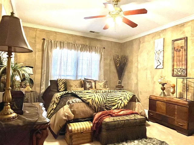 carpeted bedroom featuring ornamental molding and ceiling fan