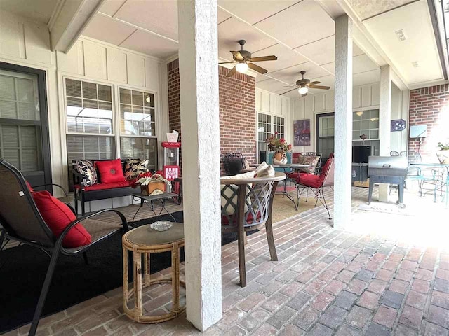 view of patio with ceiling fan