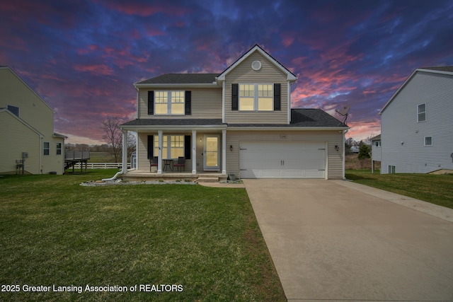 4246 Black Cherry Ln, Mason, MI 48854 - traditional home featuring a porch, concrete driveway, a lawn, and a garage