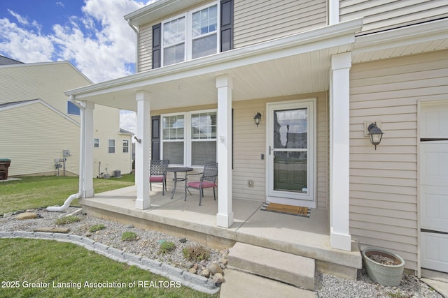 4246 Black Cherry Ln, Mason, MI 48854 - view of exterior entry with covered porch
