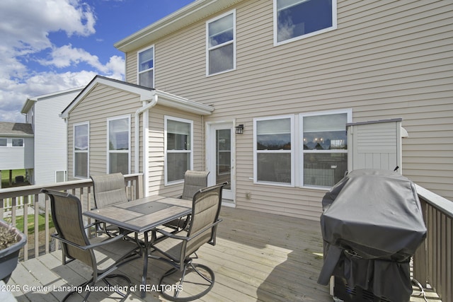 4246 Black Cherry Ln, Mason, MI 48854 - deck with area for grilling and outdoor dining space