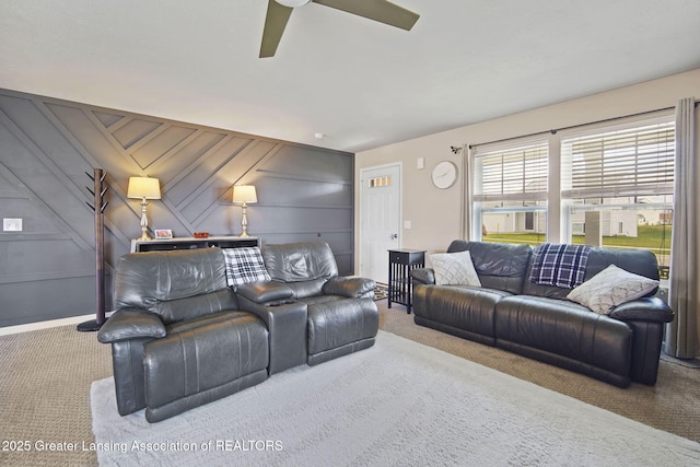 4246 Black Cherry Ln, Mason, MI 48854 - living area with carpet floors, a decorative wall, and ceiling fan