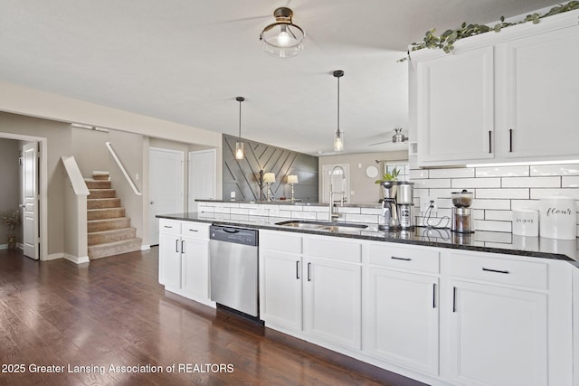 4246 Black Cherry Ln, Mason, MI 48854 - kitchen featuring dishwasher, decorative light fixtures, a peninsula, and white cabinets