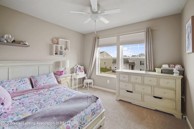4246 Black Cherry Ln, Mason, MI 48854 - bedroom featuring light carpet and a ceiling fan