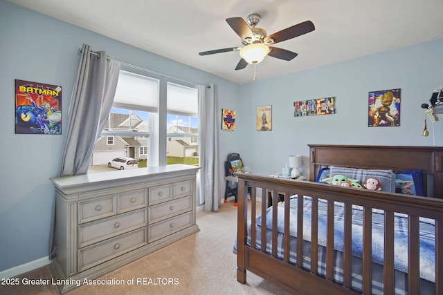 4246 Black Cherry Ln, Mason, MI 48854 - bedroom with light carpet and a ceiling fan