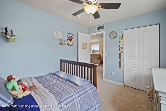 4246 Black Cherry Ln, Mason, MI 48854 - bedroom featuring light colored carpet and a ceiling fan