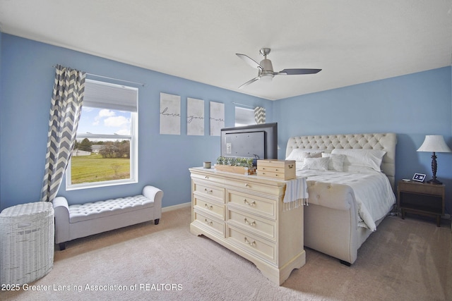 4246 Black Cherry Ln, Mason, MI 48854 - bedroom featuring light carpet and ceiling fan