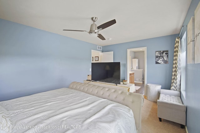 4246 Black Cherry Ln, Mason, MI 48854 - bedroom featuring ceiling fan and ensuite bathroom