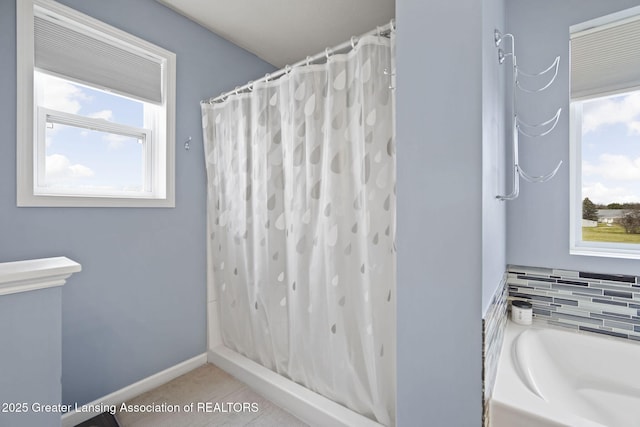 4246 Black Cherry Ln, Mason, MI 48854 - full bath with a garden tub and curtained shower
