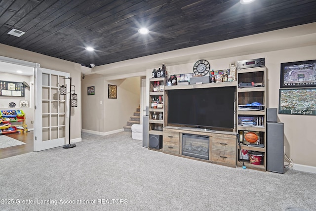 4246 Black Cherry Ln, Mason, MI 48854 - living area featuring carpet floors, stairs, recessed lighting, french doors, and wooden ceiling