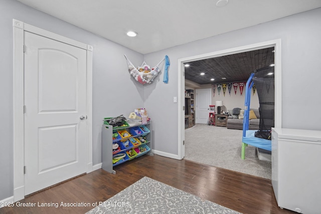 4246 Black Cherry Ln, Mason, MI 48854 - recreation room featuring wood finished floors and recessed lighting