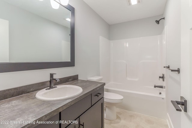 full bathroom featuring tile flooring, vanity with extensive cabinet space, shower / washtub combination, and toilet