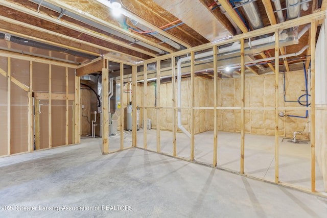 basement with heating utilities and gas water heater