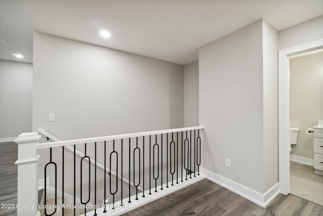 hall with dark hardwood / wood-style floors