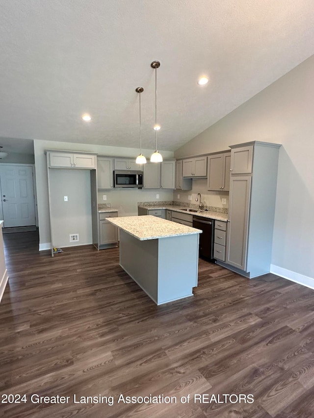 kitchen with a center island, sink, dark hardwood / wood-style floors, and dishwasher